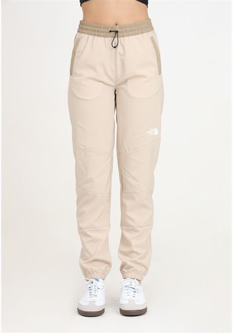 Beige windproof sports trousers for women THE NORTH FACE | NF0A87G5WO01WO01